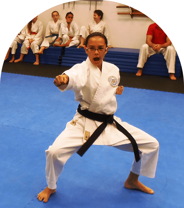 Karate class with focused student