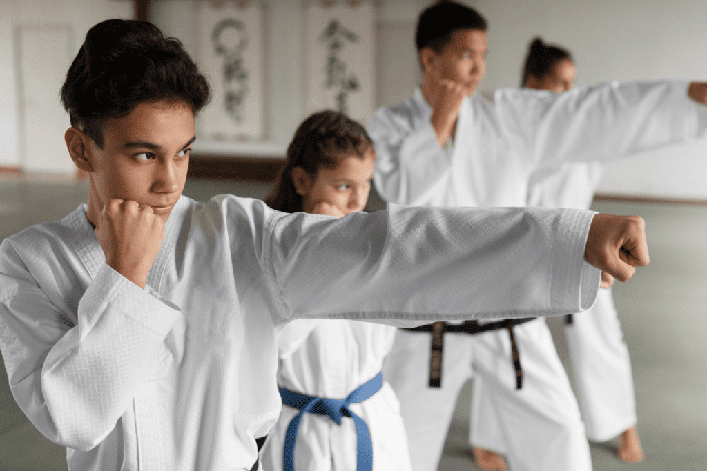 child artists in white uniforms