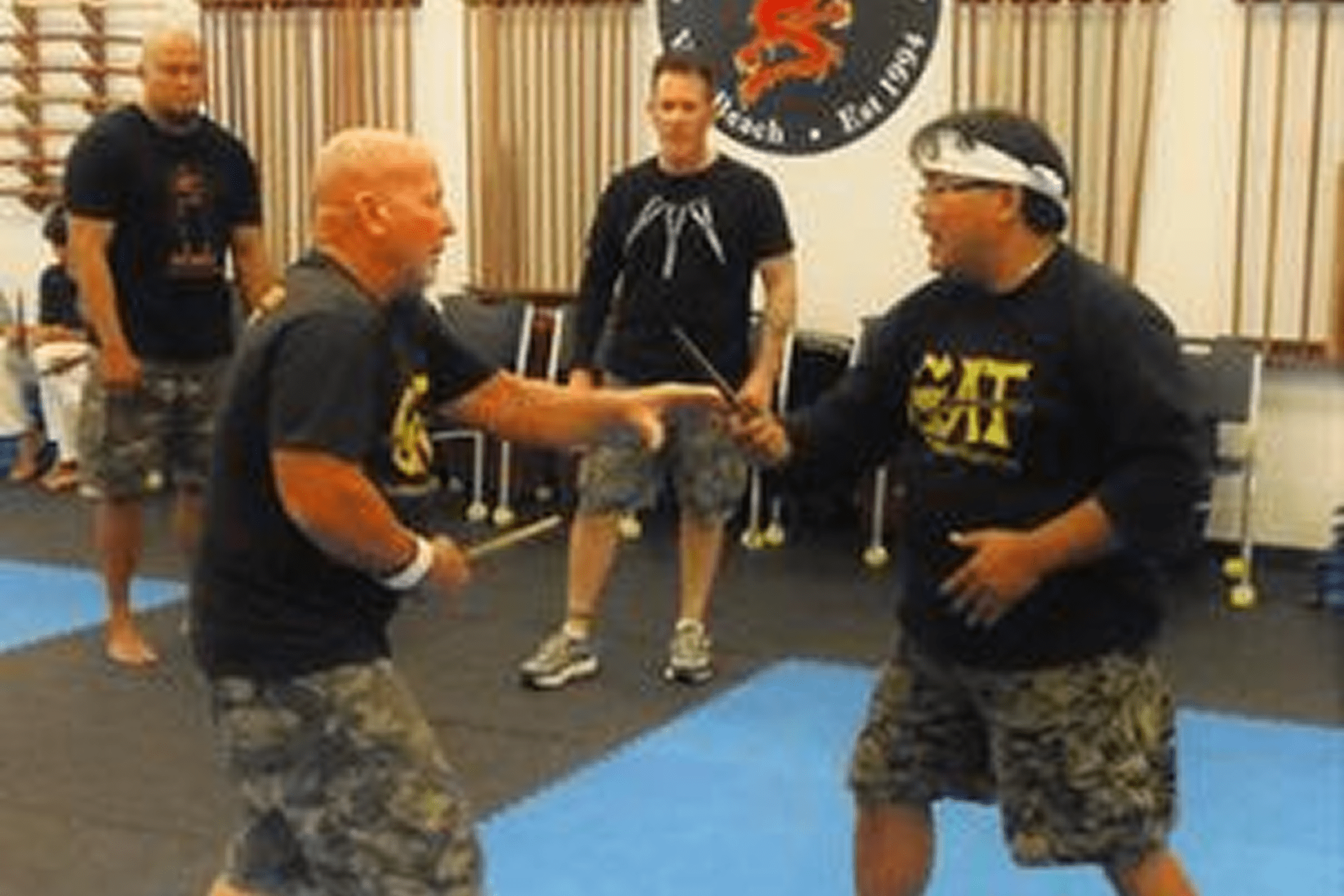 Group practicing self-defense techniques